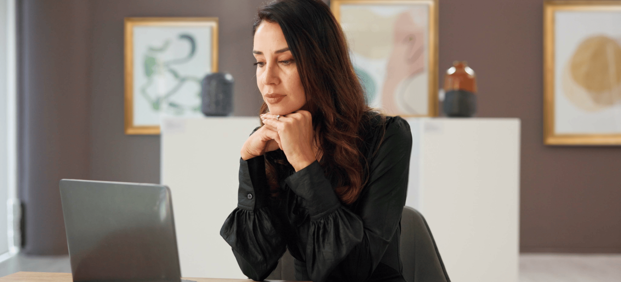 Photograph of a museum professional attending an online training course. Photograph of a museum professional attending an online training course.
